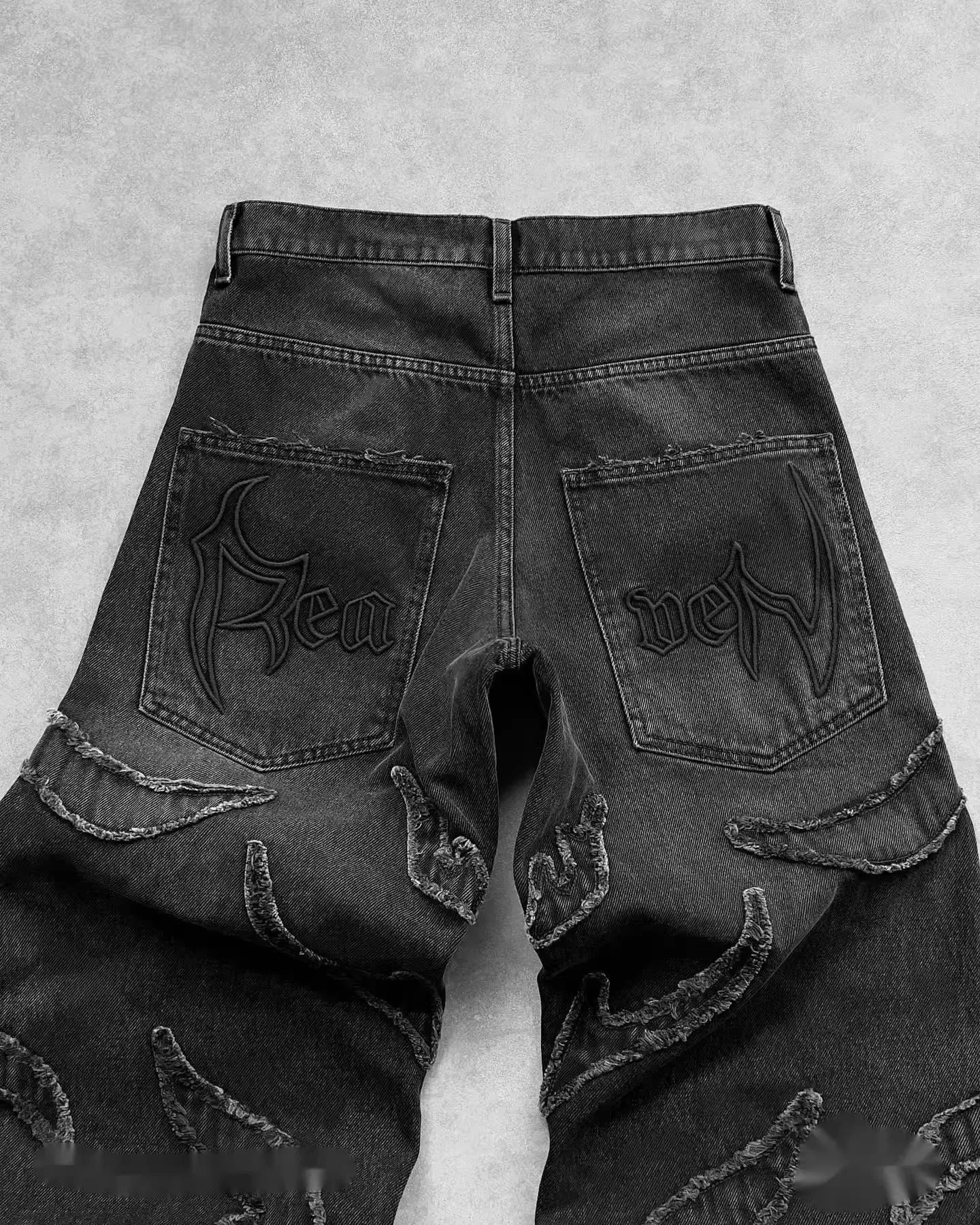 Pantalones vaqueros hip hop retro con parches negros