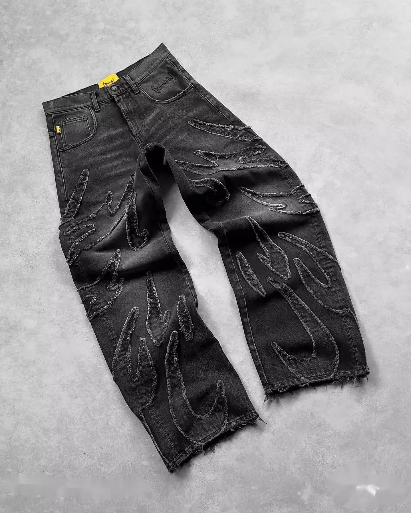 Pantalones vaqueros hip hop retro con parches negros